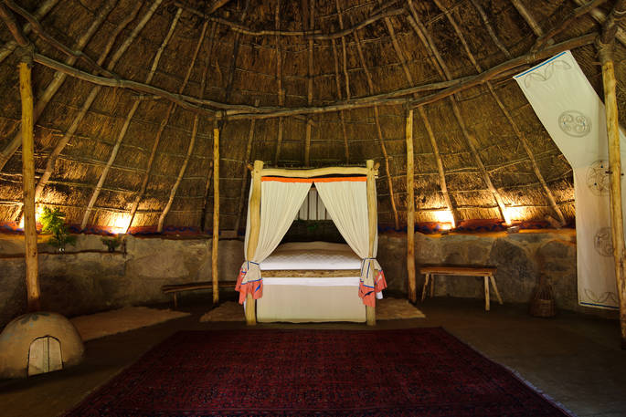 Relax in the huge comfy bed inside The Roundhouse, with goose down duvet