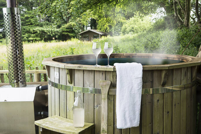 Relax and unwind in the wood fired hot tub at Berridon Farm, Devon