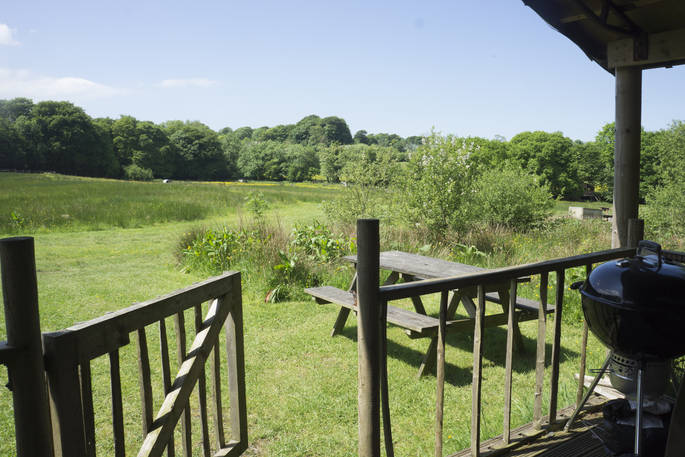 Dine al fresco at Welcombe safari tent, with beautiful views of the Devon countryside