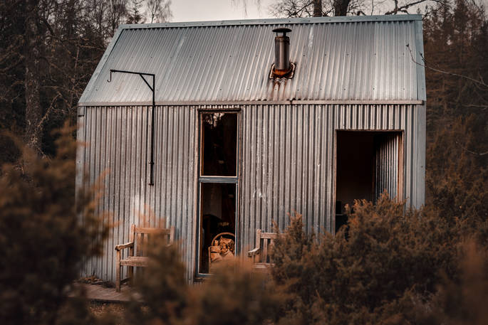 The beautiful tin exterior of The Bothy Project in Highland, Scotland