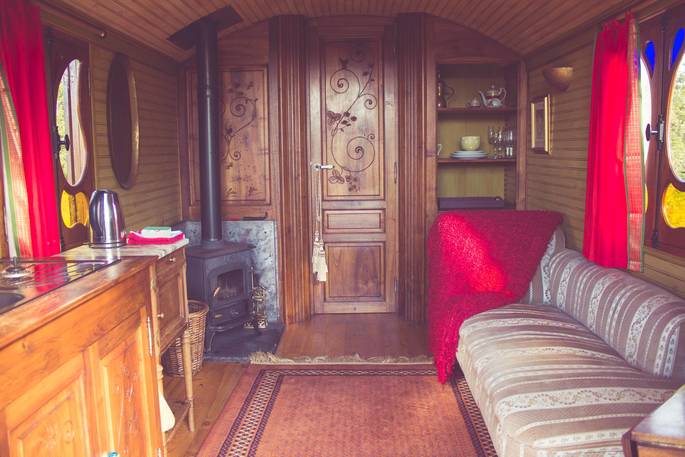 Inside the quirky and charming Gitana roulotte at Roulotte Retreat in Scotland
