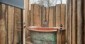 Flycatcher Treehouse outdoor bath tub at Doune, Stirling, Scotland