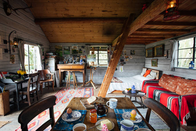 Living and sleeping space in the Log House Studio, Cwm Farm, Carmarthenshire