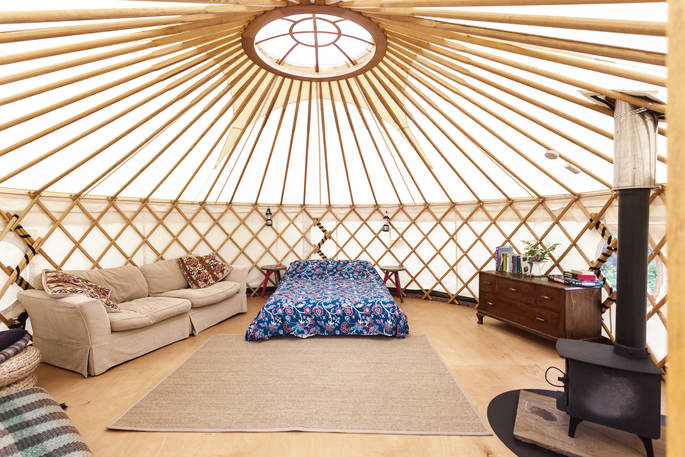 Yurt interior featuring sky light window