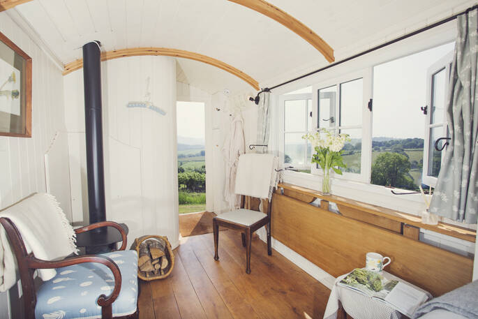 Let the breeze flow into Argoed Shepherds Hut through the door and window with views of the Black Mountains