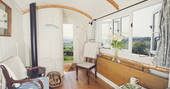 Let the breeze flow into Argoed Shepherds Hut through the door and window with views of the Black Mountains