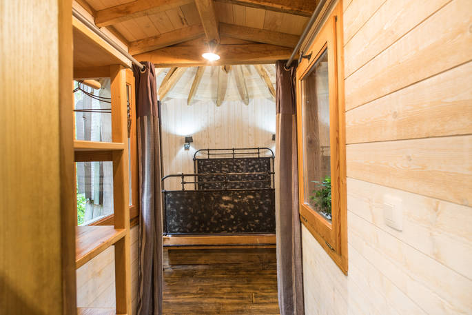 Looking into one of the double bedrooms at Hautefort Treehouse, Châteaux dans les Arbres, Dordogne, France