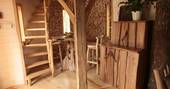 milandes dordogne france europe european glamping sunshine holidays cabin treehouse tree house interior rustic romantic winding staircase
