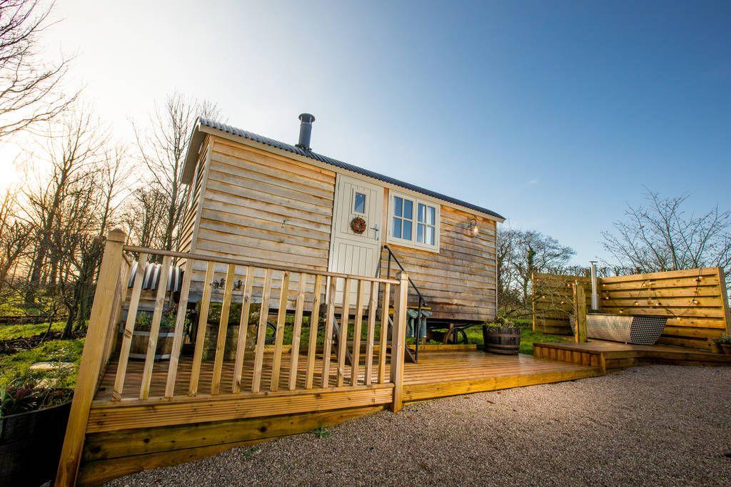 Book Shepherds Hut Spa accommodation at Glampio Gelli Glamping. Best UK  Price Guarantee