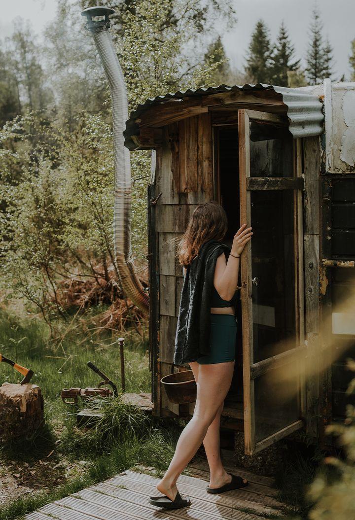 Person walking into sauna