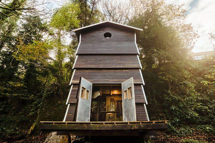 Cabin shaped like a beehive in the woodlands