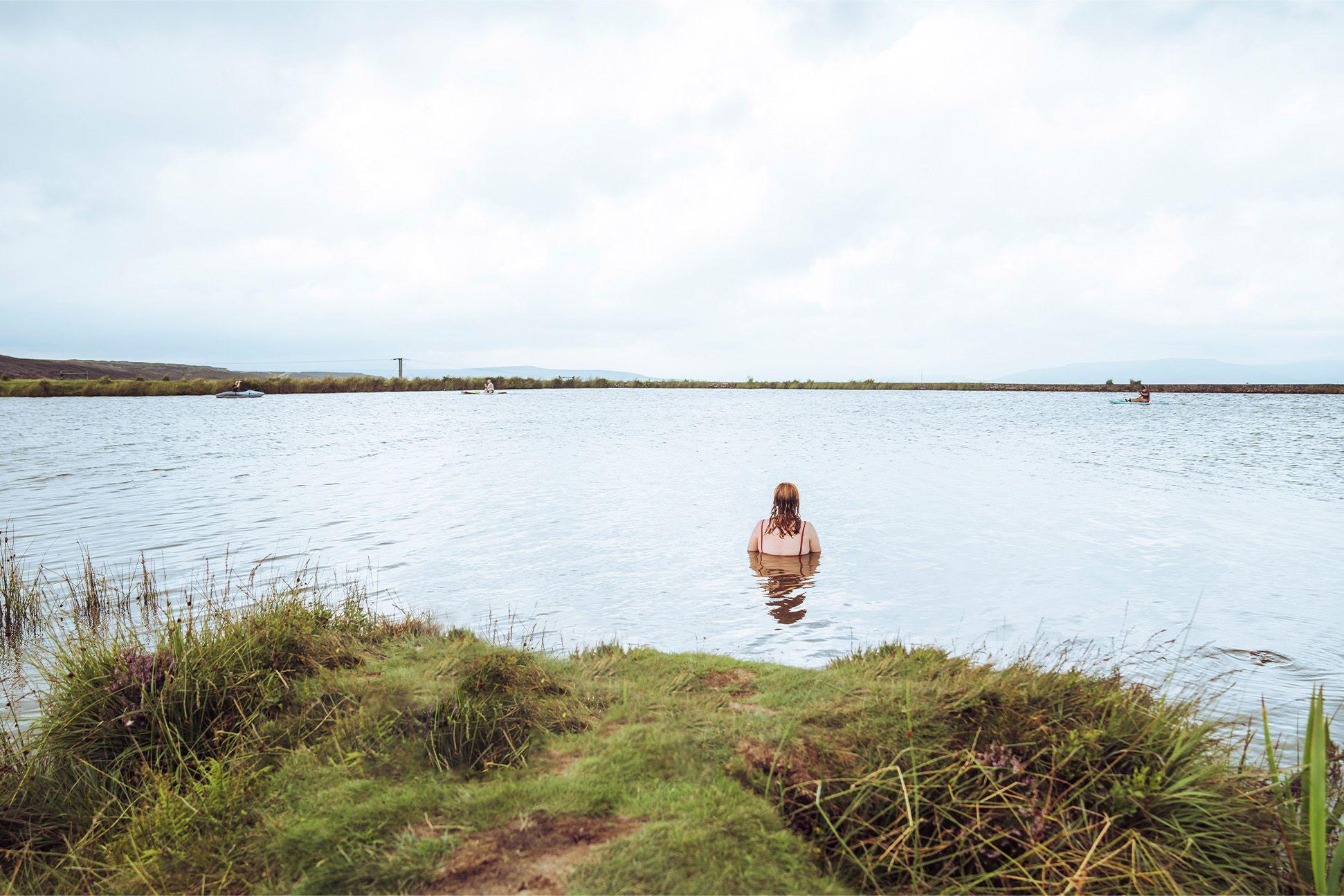 Person wild swimming in Keeper's Pond