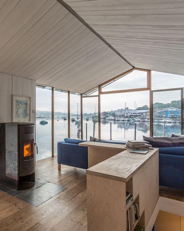 The Floathouse Amelie interior fireplace and glass