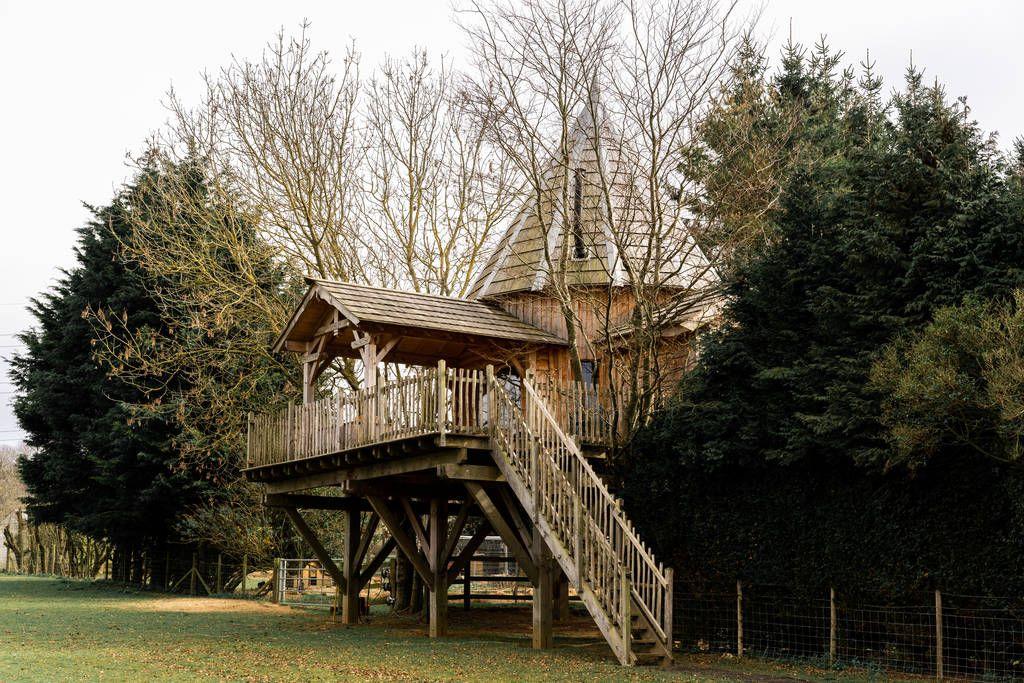 The Lodge Treehouse exterior with woodland 