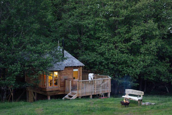 Treehouse with outdoor seating and firepit 