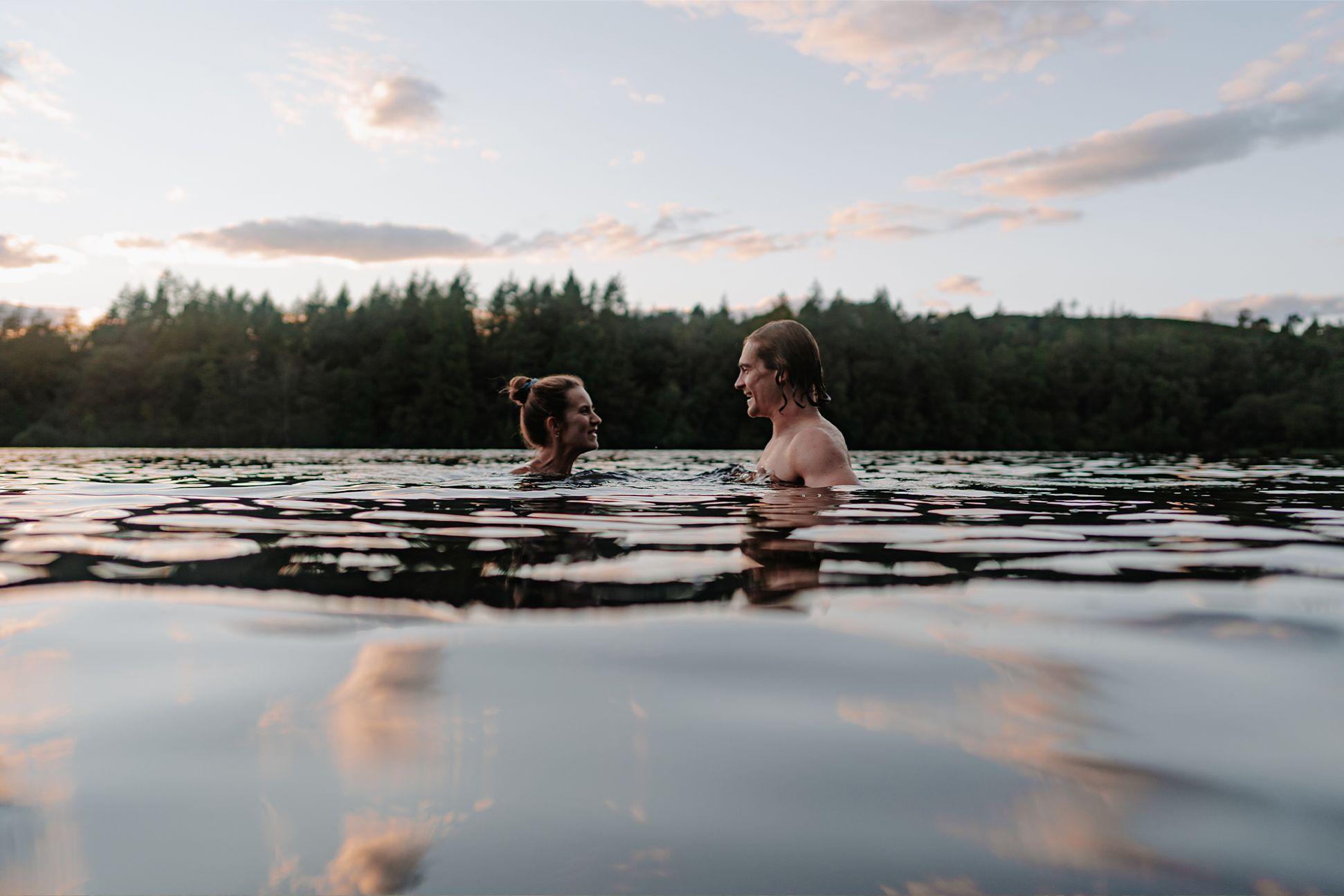 Two people wild swimming together