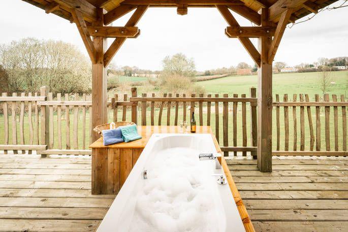 The Lodge Treehouse outdoor bath on decking 