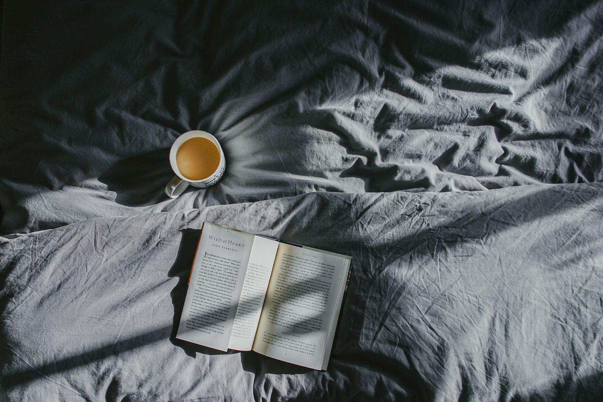 A open book and cup of tea 