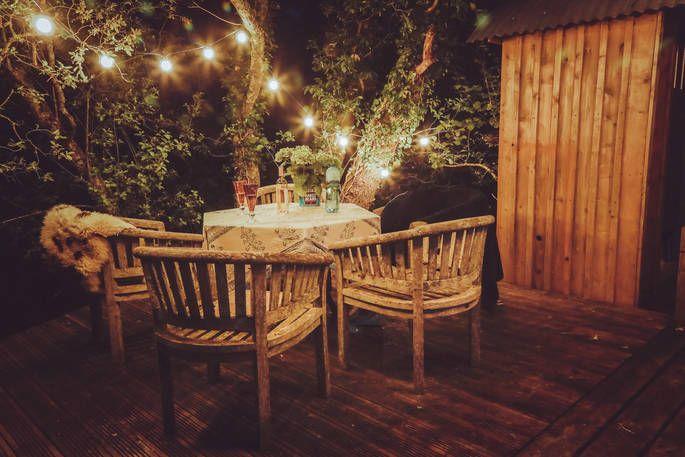 The Barrel Top outdoor seating with fairy lights 