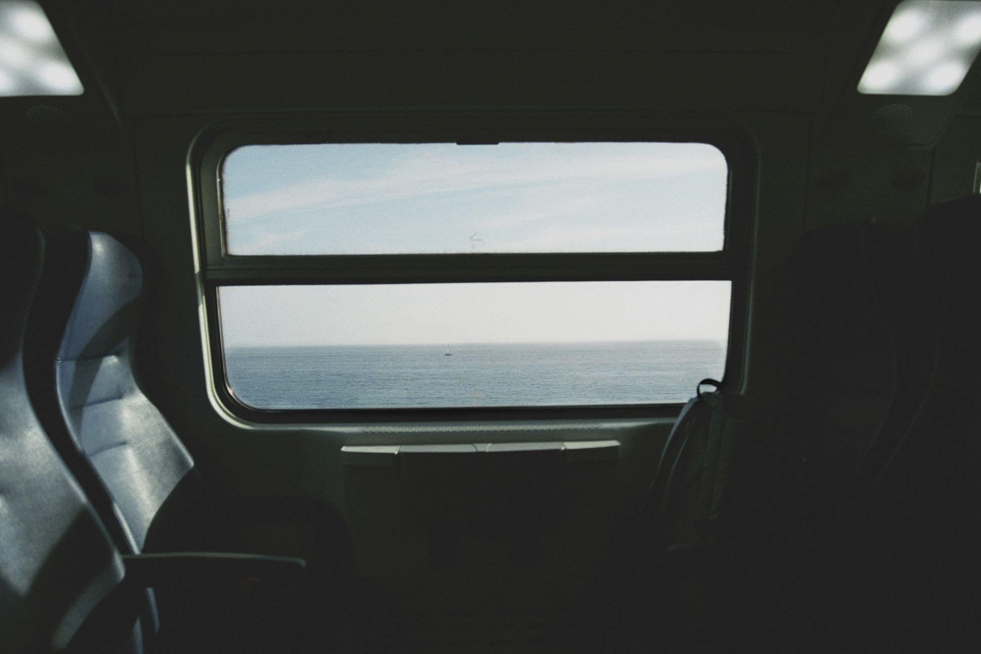 Train window with view of the sea 
