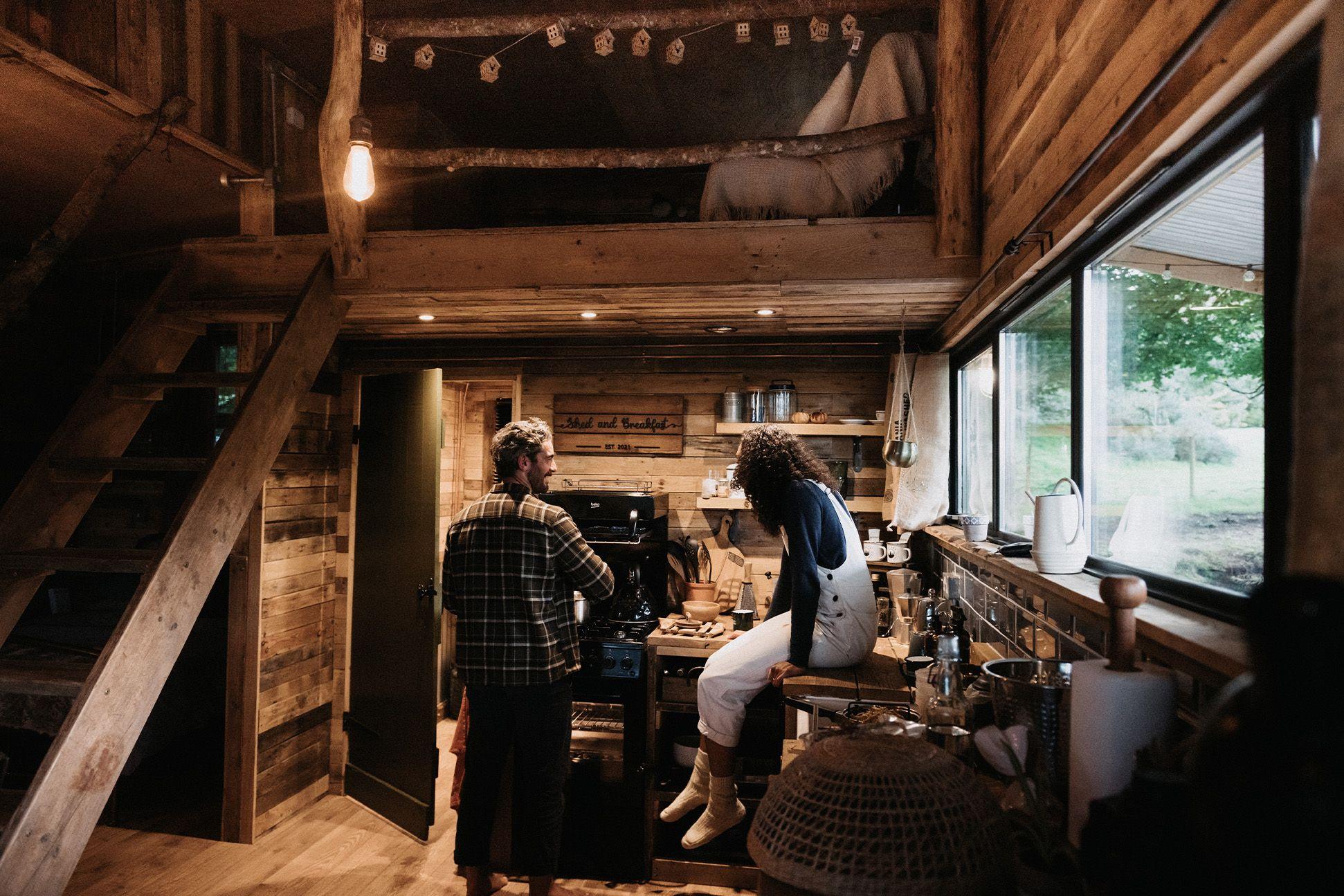 Two people talking in a cabin 