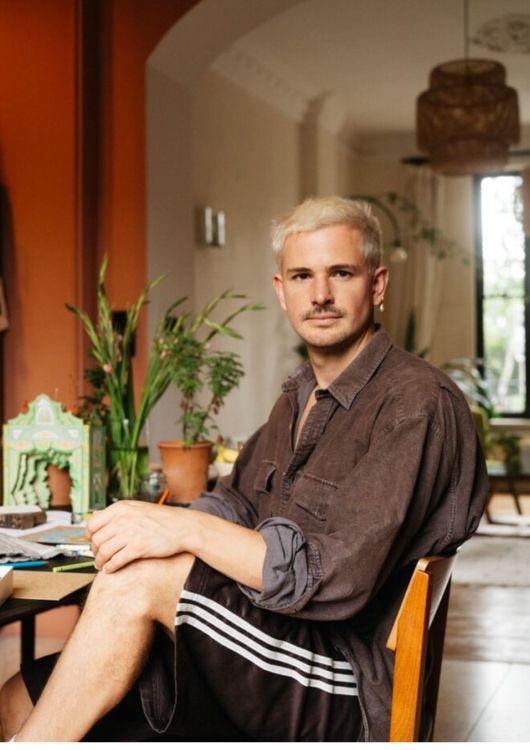 Rollo at his dining table