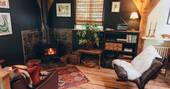 8 - Living area with a wood burner