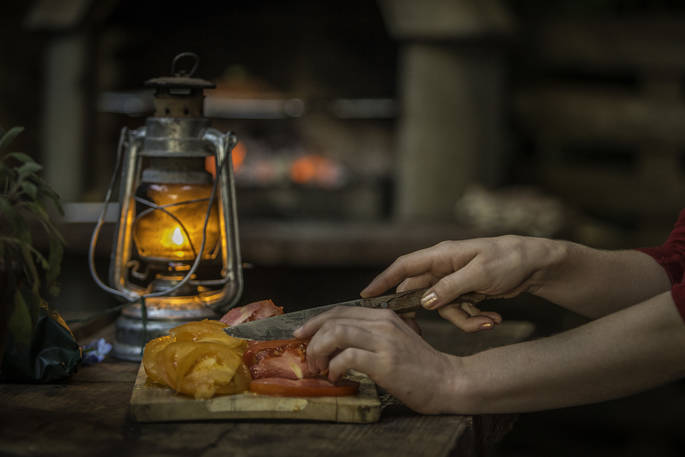 Prep your toppings for the wood-fired pizza oven at The Farm Camp in Wiltshire