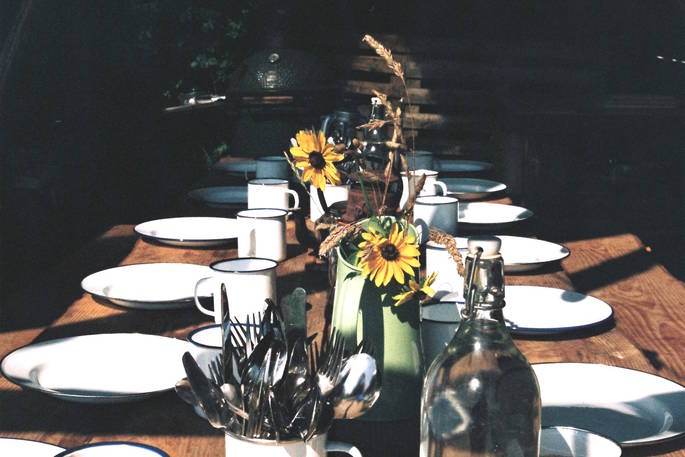 wossnem at the farm camp dining table