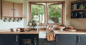 Kitchen equipped with an oven, two ring hob and undercounter fridge