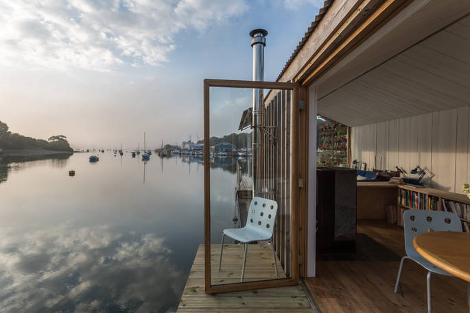 Sit out on the smaller deck beside the kitchen on the water's edge