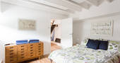 The master cabin below deck with king-size bed at Amelie in Cormwall 