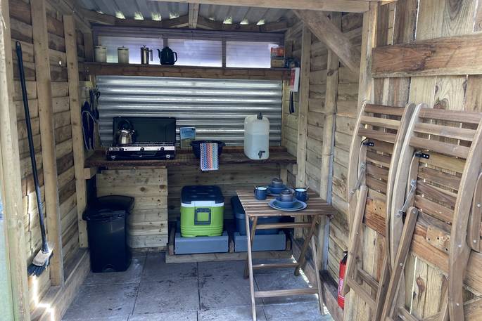 Lost Meadow Treepod treehouse - outdoor covered kitchen, Broom Park Farm, Bodmin, Cornwall