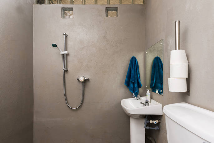 Interior of bathroom with shower and sink at The Link