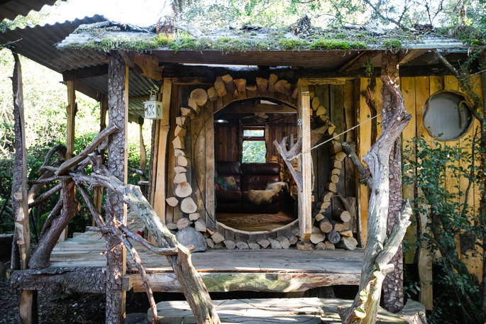 Exterior of The Stumpy Hobbit cabin at Mill Valley in Cornwall