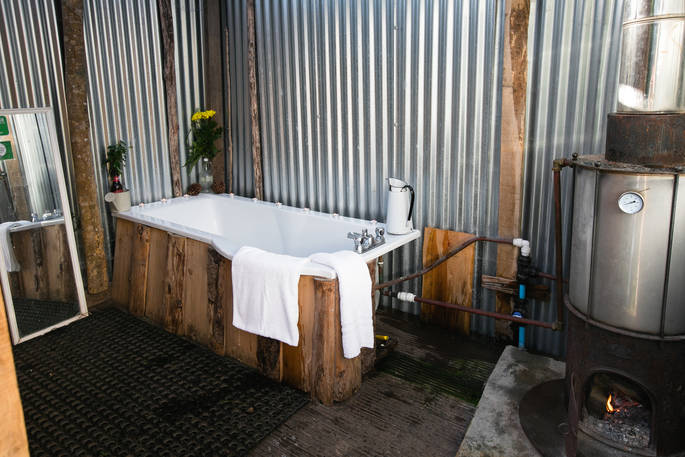 The tin bathroom cabin at Mill Valley Farm in Cornwall