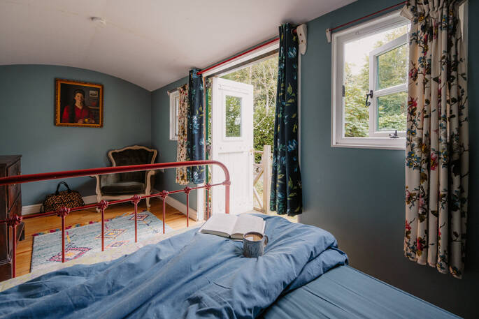 Double bed in a the cosy hut