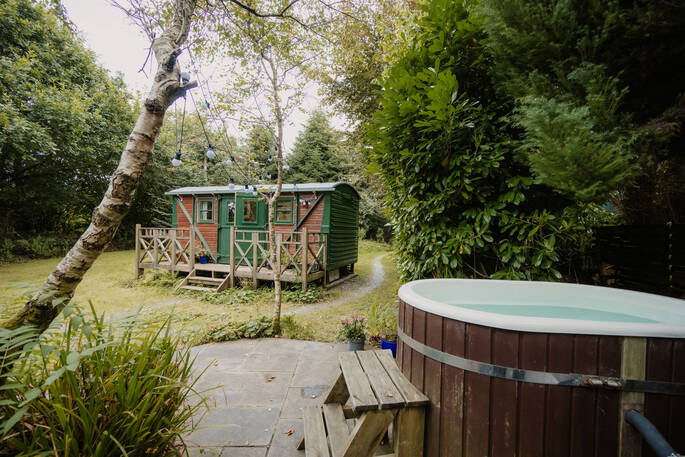 Maiden hut has a wood-fired hot tub