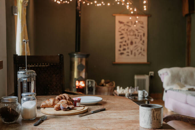 Wood burner inside both Wisteria cottage and Maiden