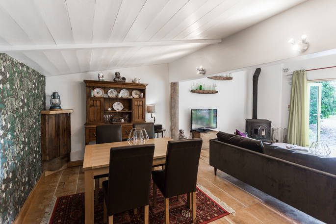 cottage, wood burner, television, dining area, living area