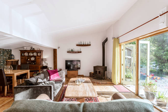 cottage, living area, open plan, big windows, wood burner