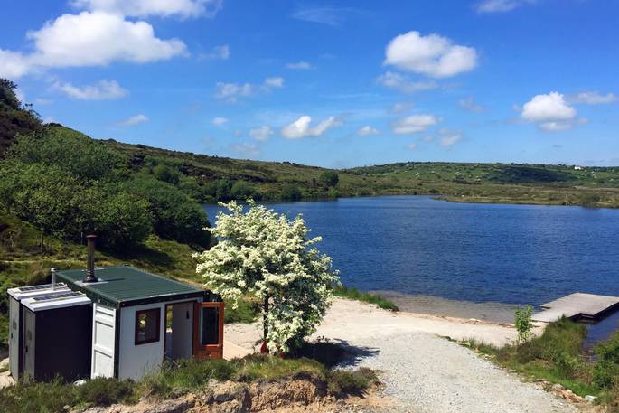 shipping container cabin private lake bodmin moor cornwall lakeside view