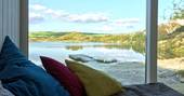 view from the bed shipping container cabin private lake secluded cornish holiday 