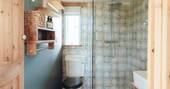 6 - bathroom with a hot shower, sink and flushing toilet
