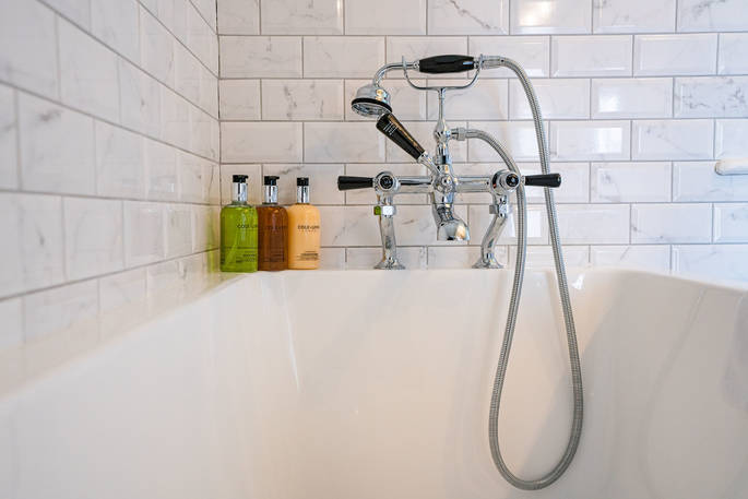 Cuckoo Cottage bath tub and toiletries, Edenhall Estate, Penrith, Cumbria