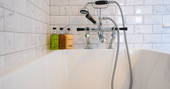 Cuckoo Cottage bath tub and toiletries, Edenhall Estate, Penrith, Cumbria