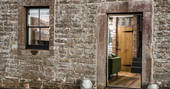 Entrance into The Bothy at High Barn at Edenhall estate in Cumbria 