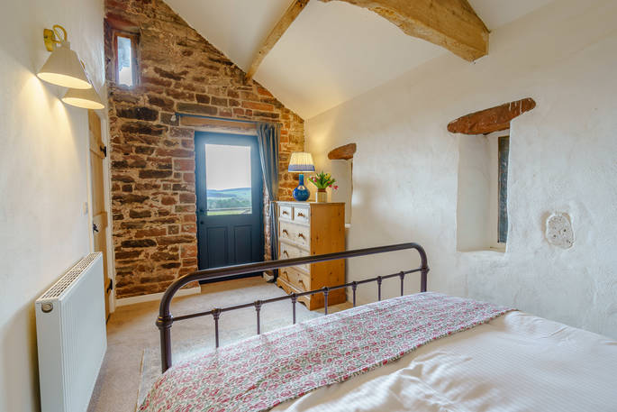 High Barn - bedroom with balcony, Edenhall Estate, Penrith, Cumbria