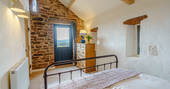 High Barn - bedroom with balcony, Edenhall Estate, Penrith, Cumbria