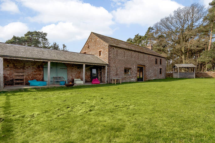High Barn - exterior with lounging area, Edenhall Estate, Penrith, Cumbria